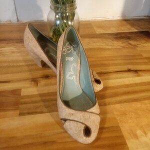 Women's pink studio kitten heels.